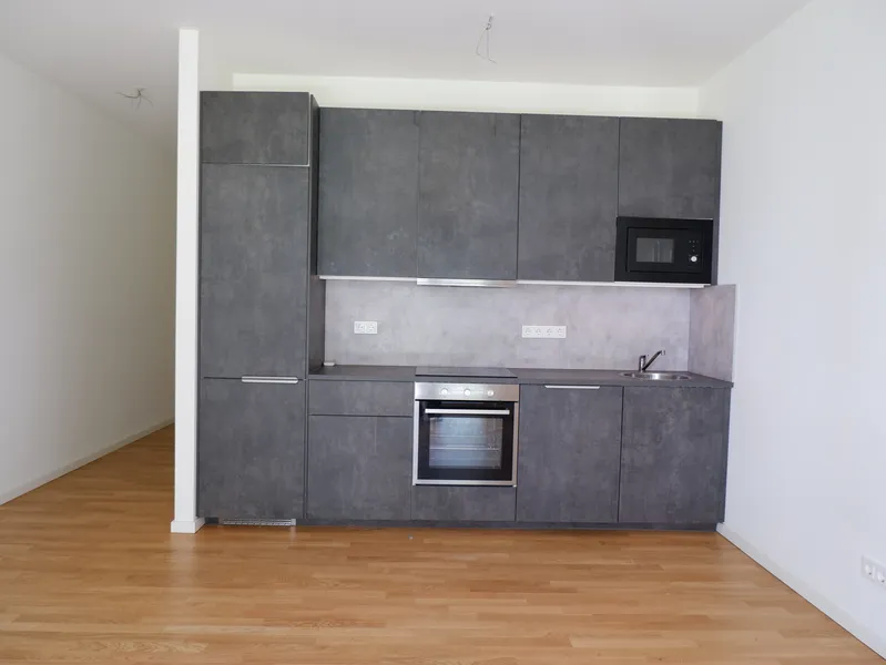 Moderne 1-Zimmer-Wohnung mit eigenem Garten – Erstklassige Lage nahe Ostbahnhof — photo 1